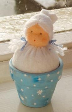MUÑECA EN MACETA - BOLA DE NIEVE